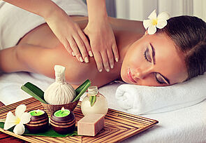 Body care. Spa body massage treatment. Woman having massage in the spa salon