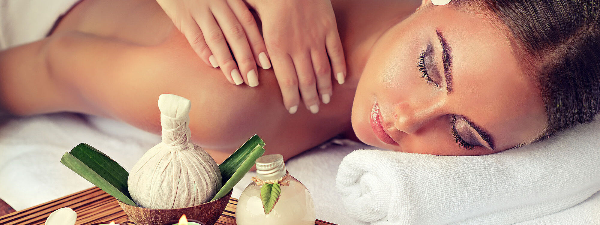 Body care. Spa body massage treatment. Woman having massage in the spa salon